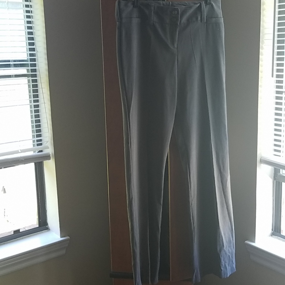 Grey slacks.
